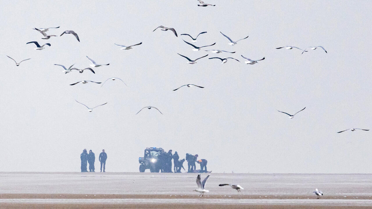 Six arrested after migrants' bodies found on French beach