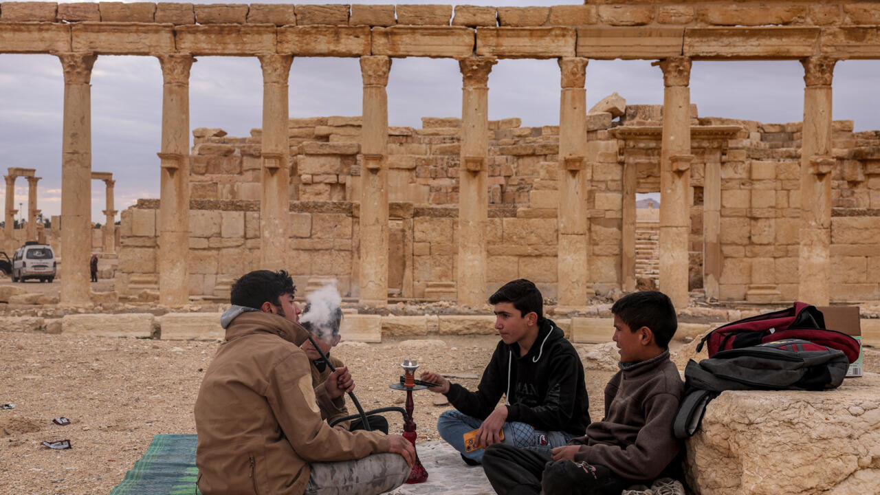 Syrians back to famed Palmyra ruins scarred by IS